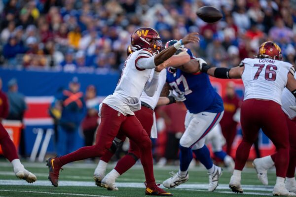 Lamar Jackson em Rumo ao MVP: A Disputa Acirrada com Jayden Daniels!